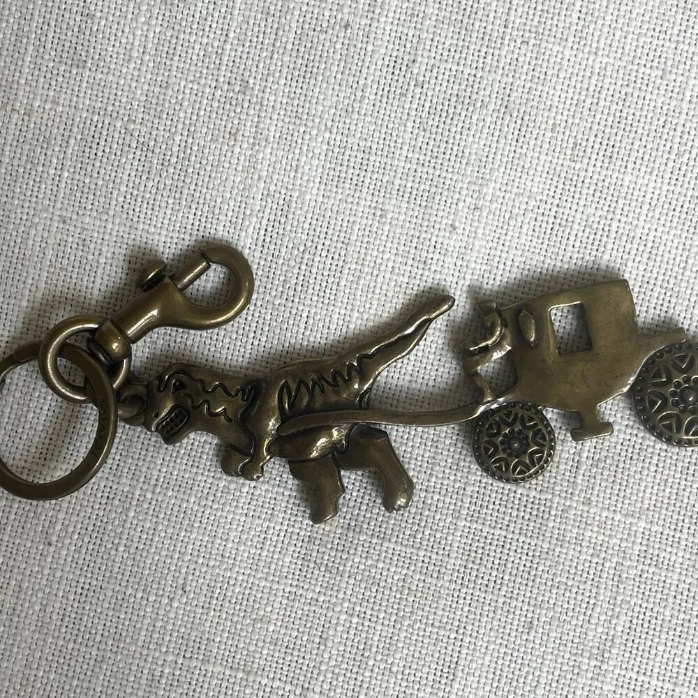RARE Coach Rexy Horse & Carriage Bag Charm 24011 | Brass Dinosaur
